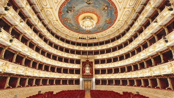 Watercolour: Teatro Regio Parma, red and gold auditorium with stacked boxes and central chandelier